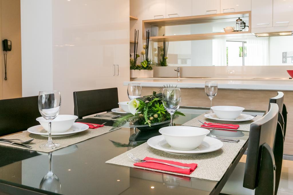 Grand Mercure Allegra Hervey Bay Exterior photo A dining room table set for dinner